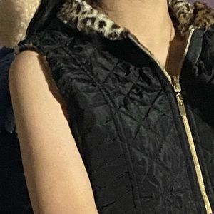 Reversible cheetah print zip up vest with gold zipper & button detailing